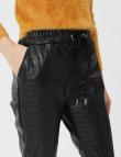 Фактурные черные брюки из эко-кожи от Pink Black 